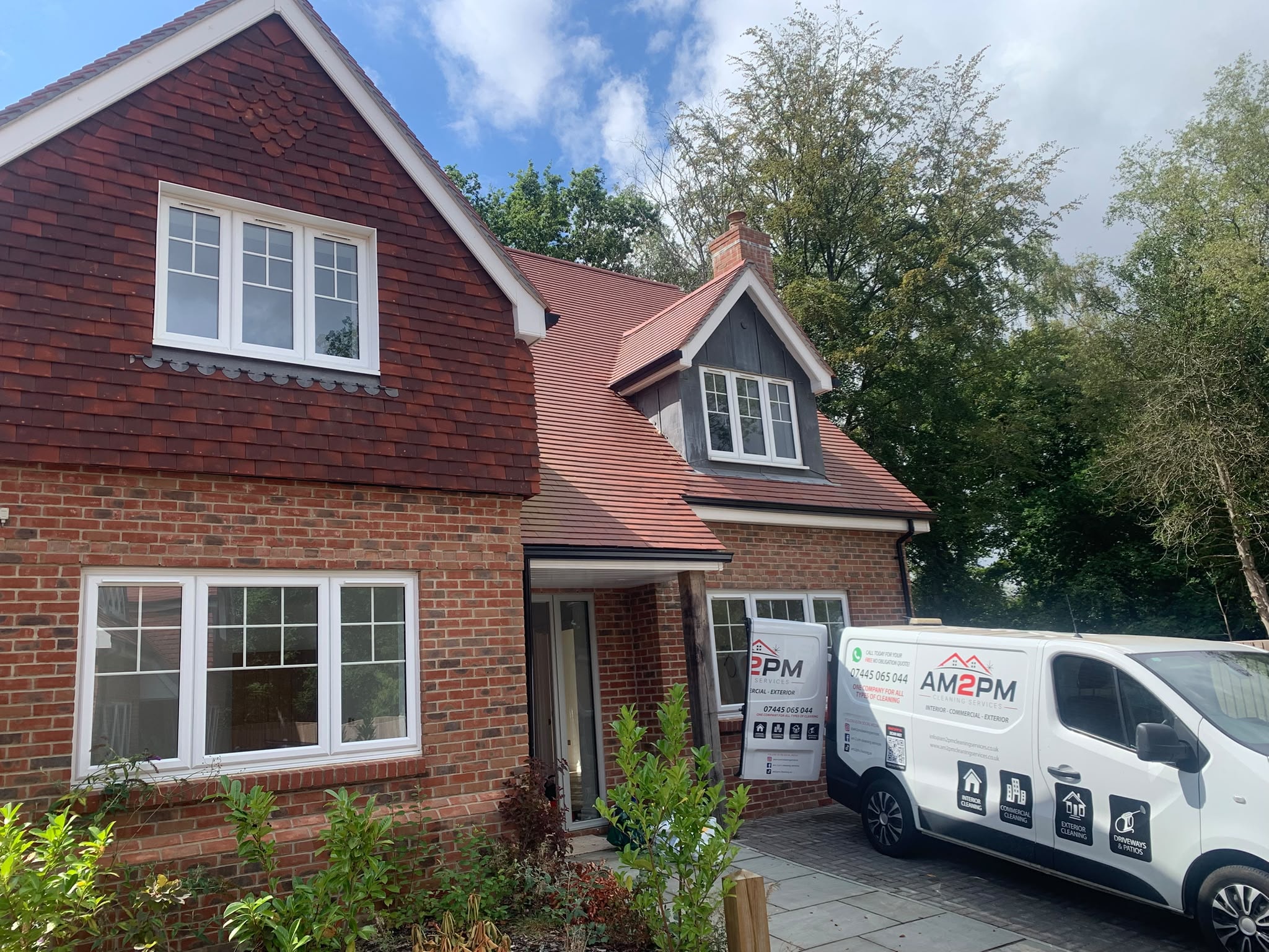 AM 2 PM Cleaning Services van on site at new build property in Surrey