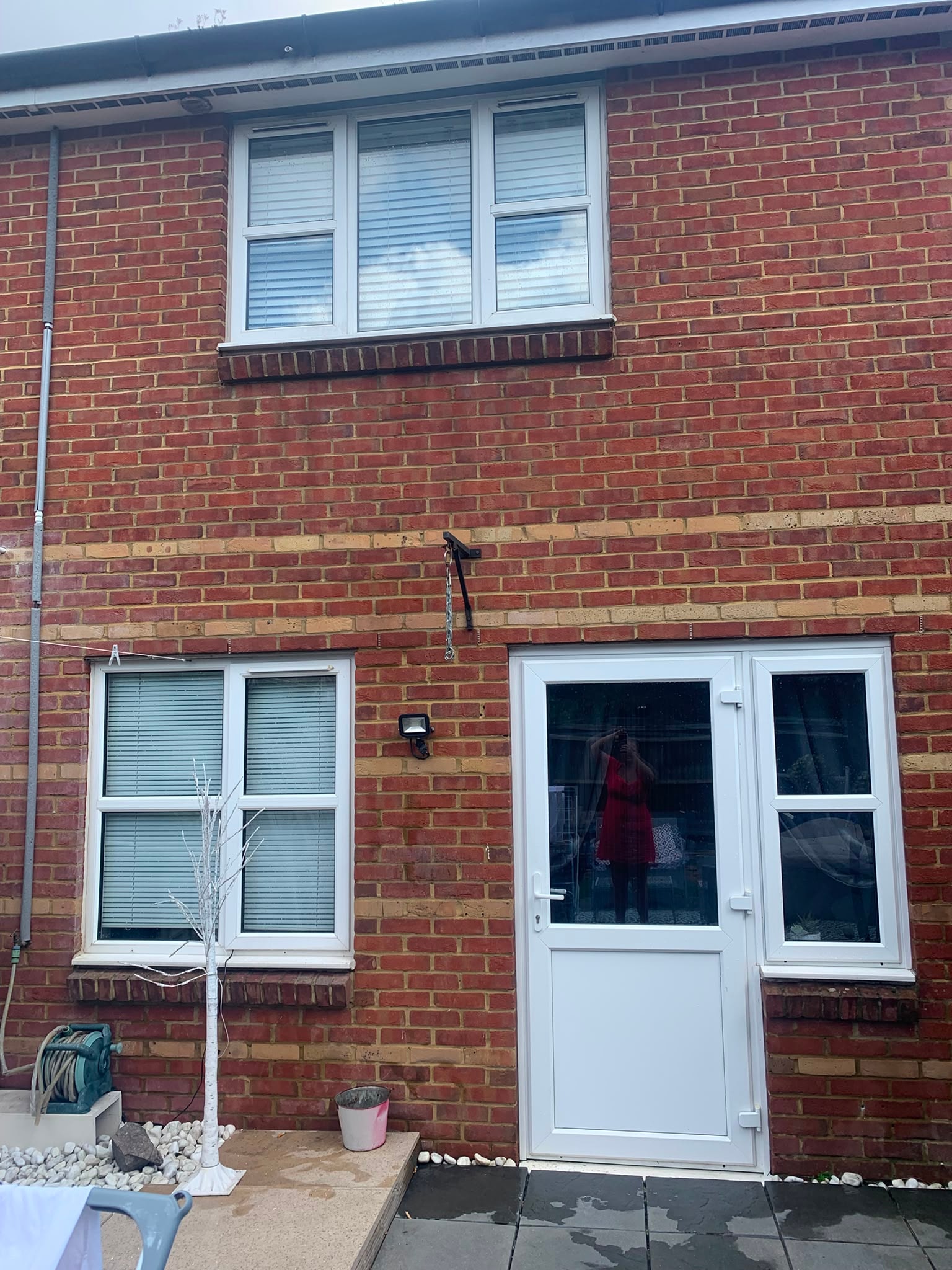 Brick residential property exterior after professional window and door cleaning